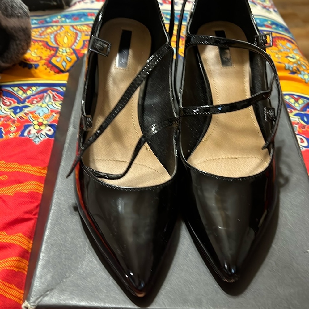 These Mary gane have been wore twice very nice patented leather